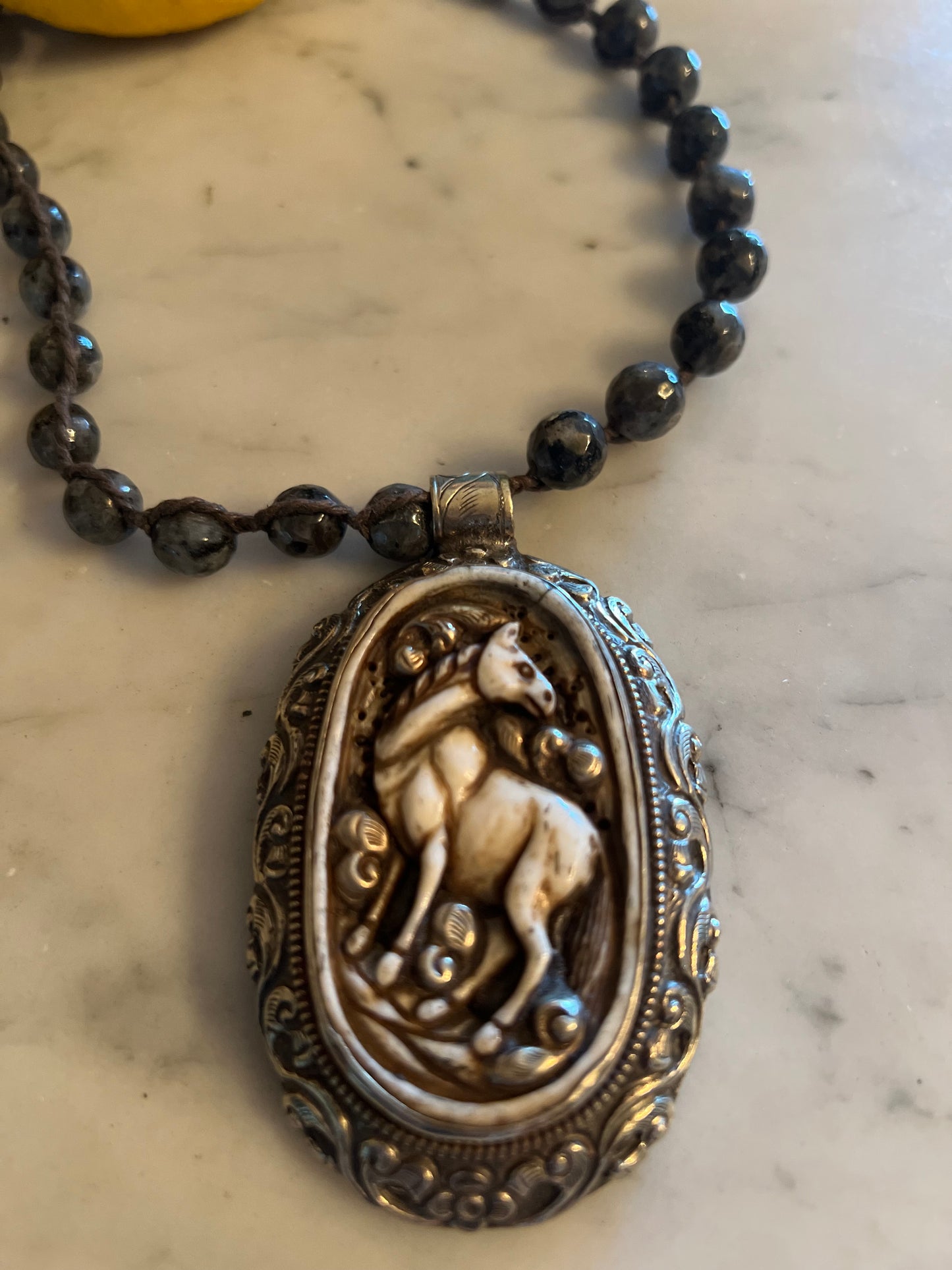 Carved Horse on Black Agate 698