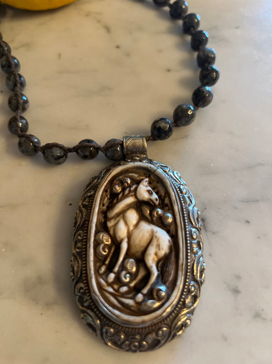 Carved Horse on Black Agate 698