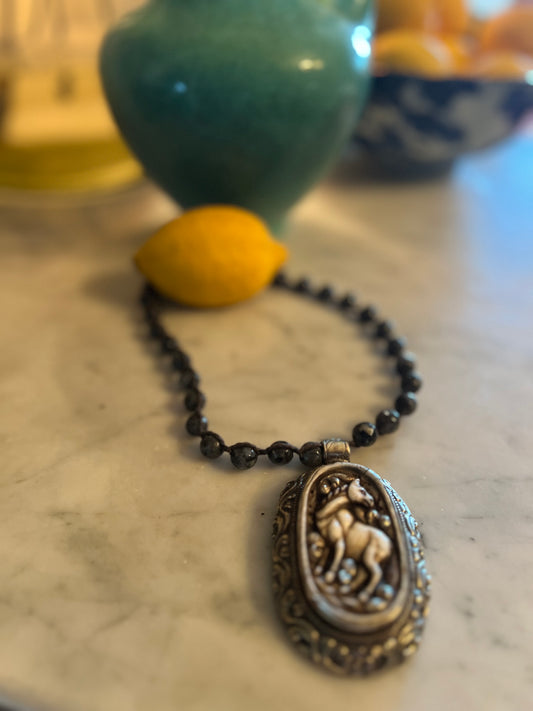 Carved Horse on Black Agate 698