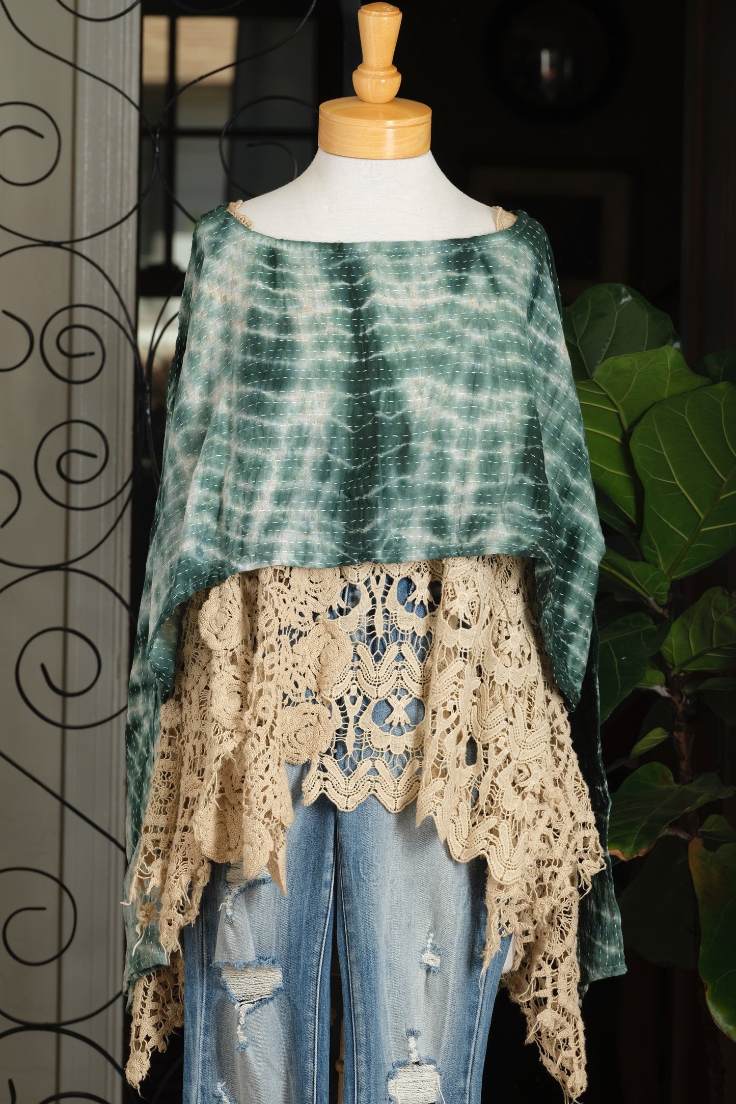 A bohemian style crop top in green and white tie dye