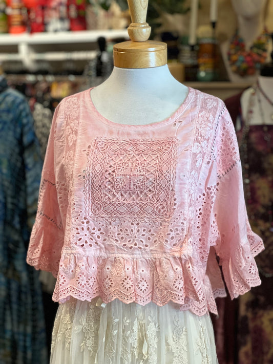 A light pink eyelet lace blouse with three-quarter ruffled sleeves and a scalloped hem.
top
softly worn top
one size
eyelet
Dear Heart Eyelet Top in Too Sweet
blouse