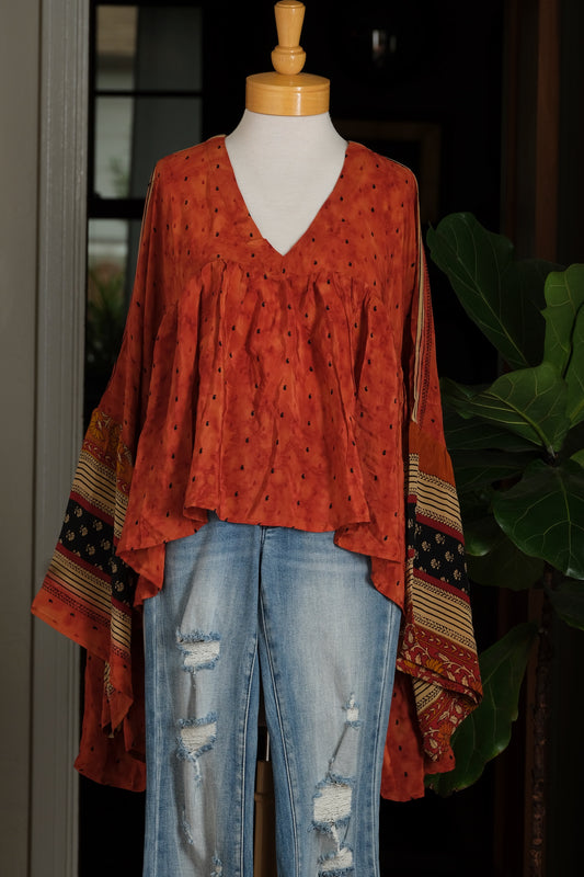 vneck

silk top

rust

one size 0-22

one size

gold dust crop top