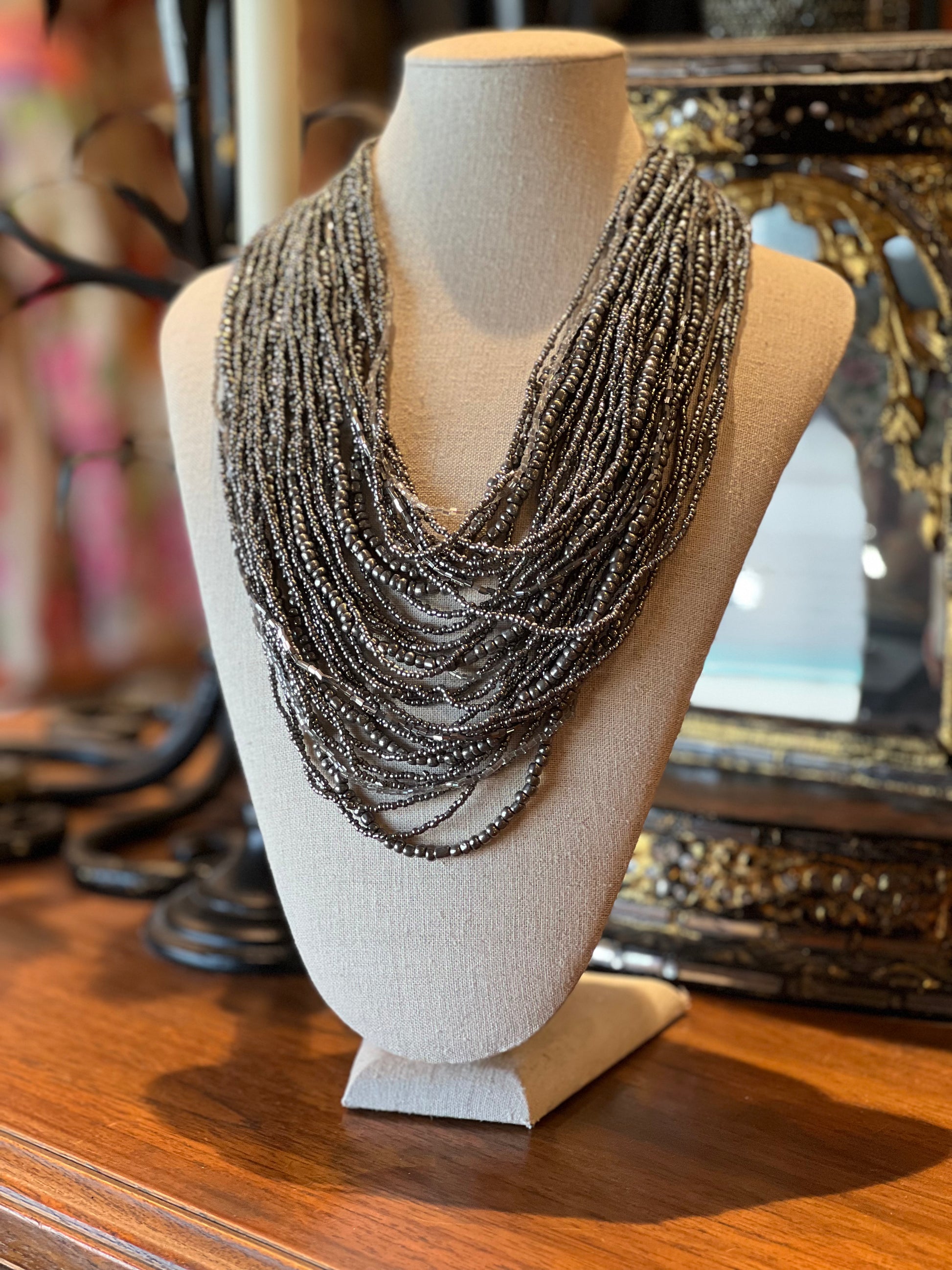 wooden clasp

pewter color

necklace

beaded necklace

beaded