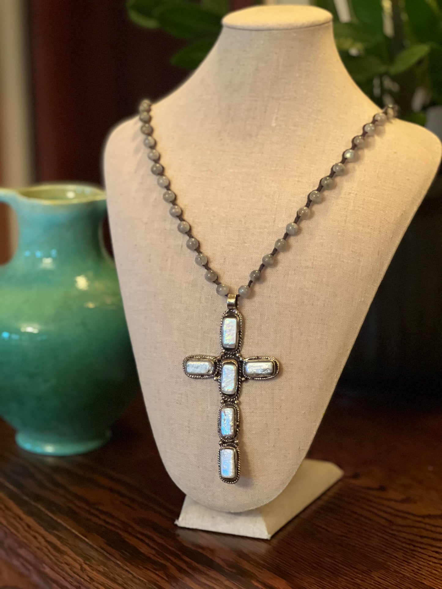 sterling silver plated

solid bronze

pearl cross

natural stones

hand casted

cross necklace

cross

chateau bel age